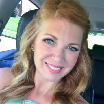 A smiling headshot image of Tracy Manning.