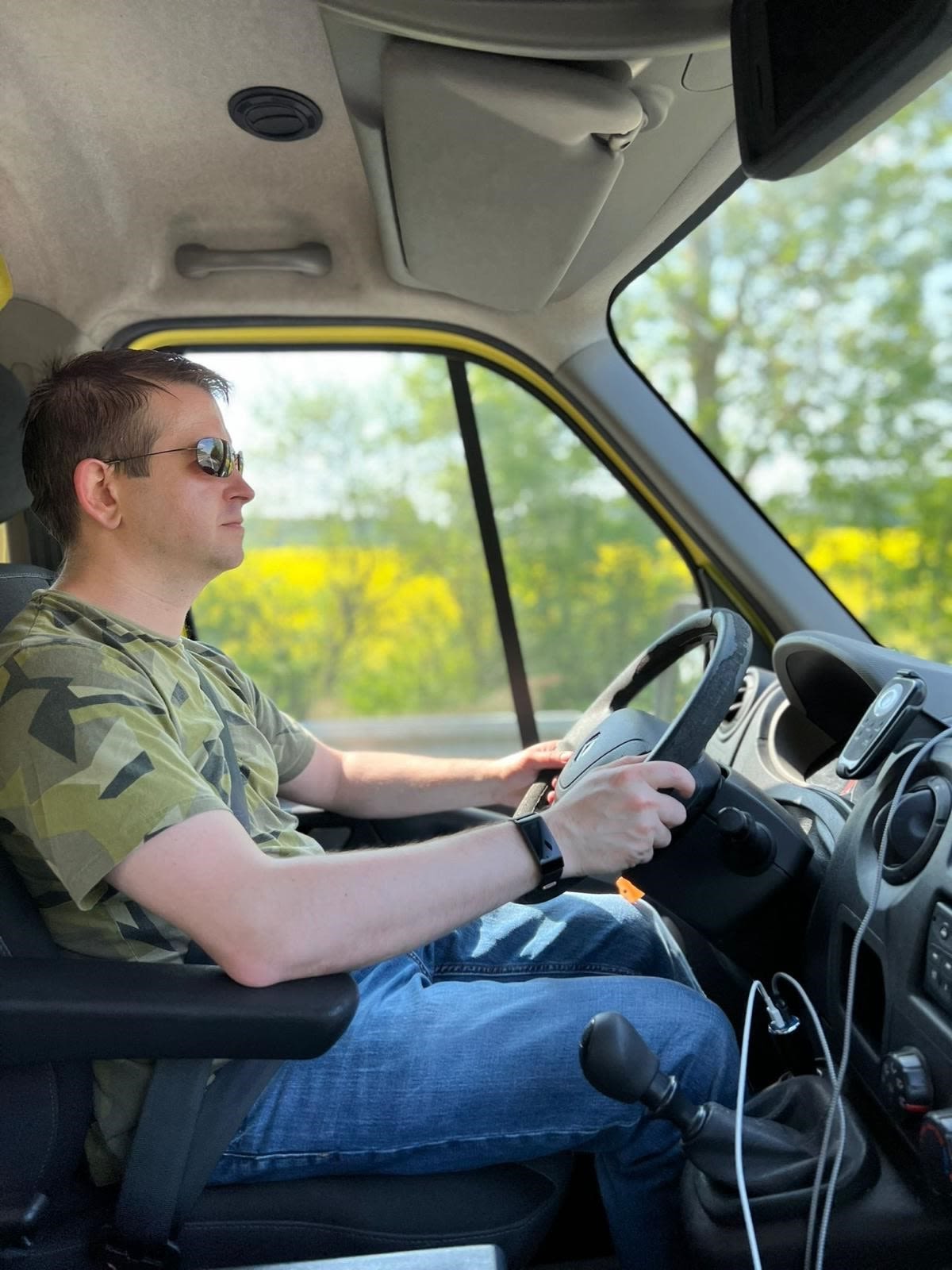 Sergey Storm driving an ambulance in Ukraine.