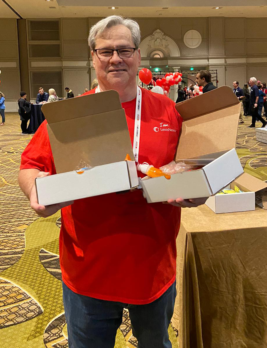 Risk employee volunteering at Project Helping event.